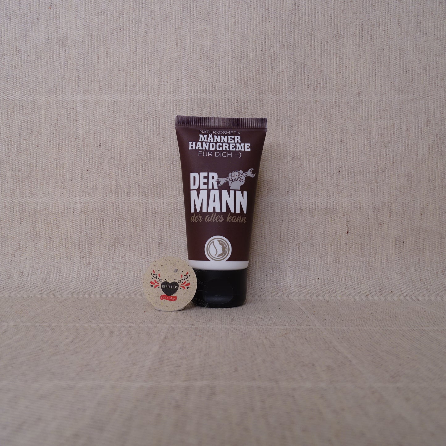 Crema per le mani con scritta: L'uomo che può fare tutto